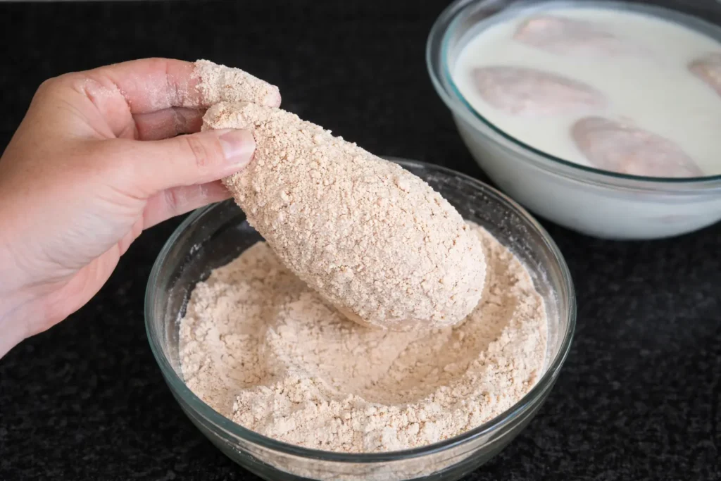 KFC Chicken Breast 8 Dredge the chicken breast in flour mixture