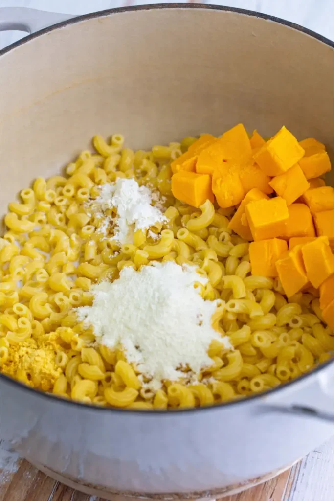 Copycat KFC Mac and Cheese Recipe, Calories & Nutrition Guide 2026 6 KFC mac and cheese recipe ingredients placed in big pot