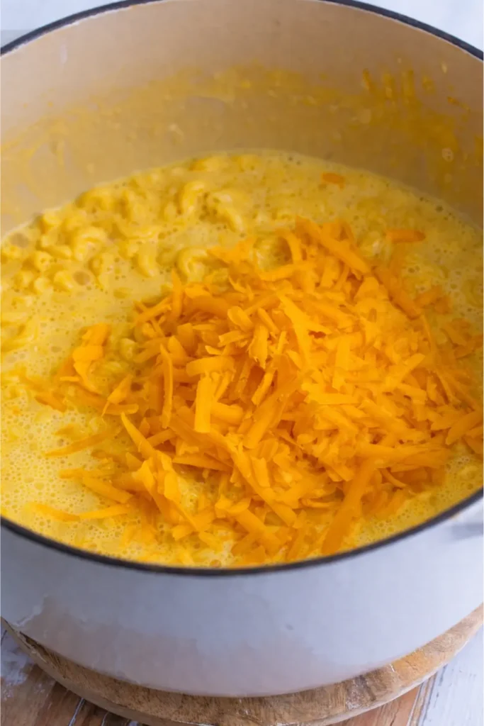 Copycat KFC Mac and Cheese Recipe, Calories & Nutrition Guide 2026 8 KFC mac and cheese with creamy cheddar sauce and elbow pasta served in a bowl